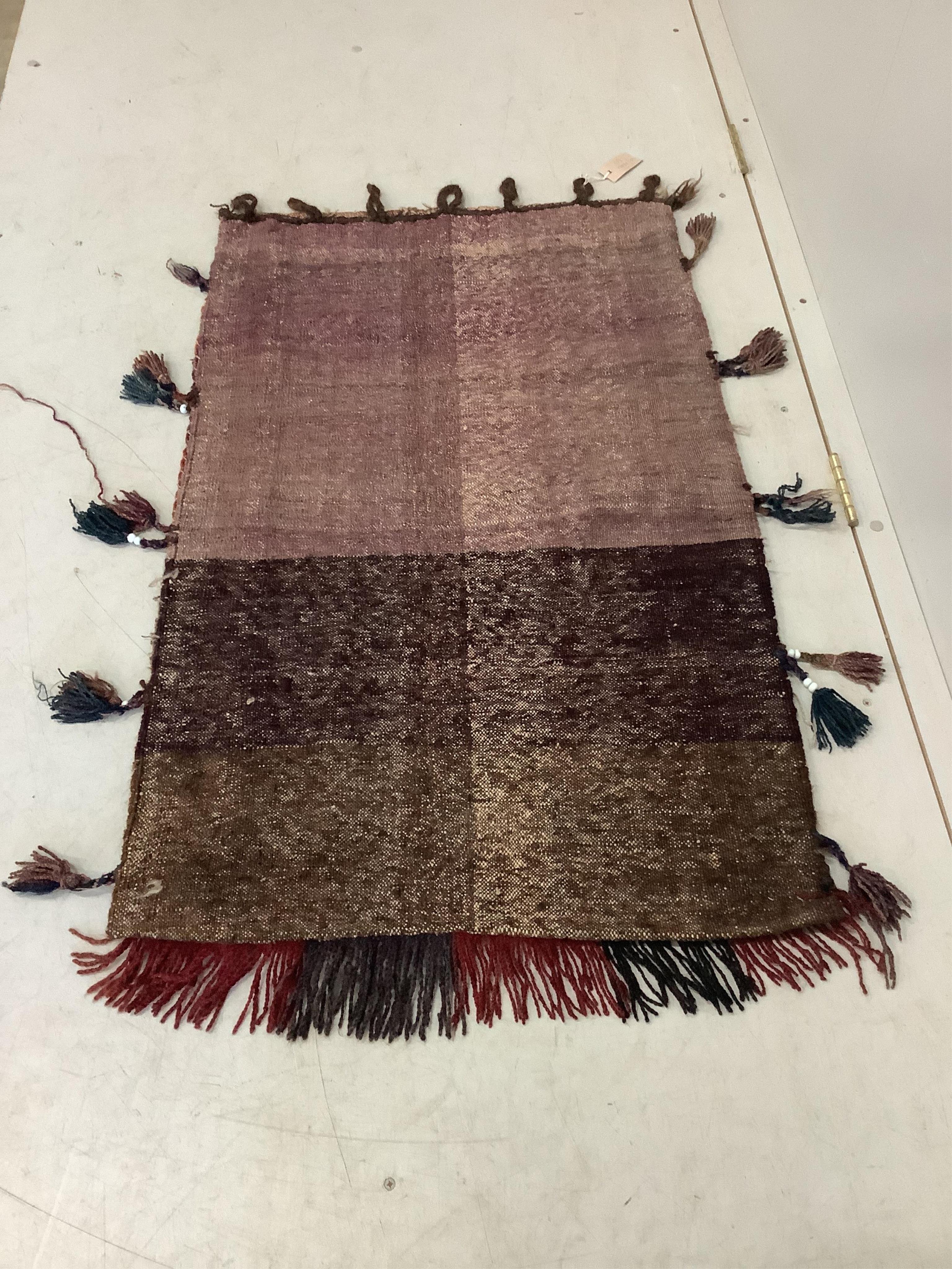 An Afghan flatweave salt bag, a double saddle bag and one other bag, largest approximately 120 x 80cm